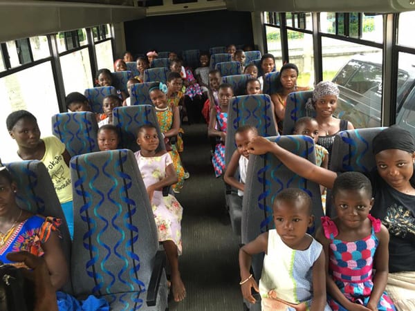 Orphans Ready for Trip in Bus